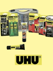 2-vollgepackter-Koffer-mit-Klebstoffen-von-UHU
